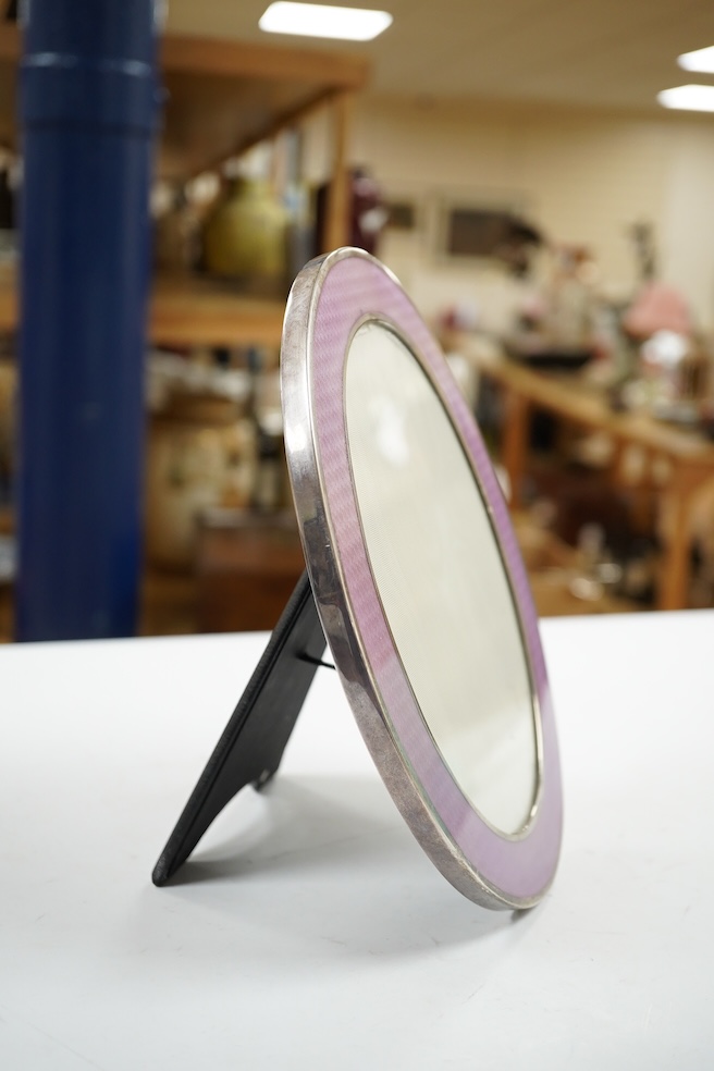 A modern Italian 925 and guilloche enamel mounted oval photograph frame, 22.8cm. Condition - fair to good